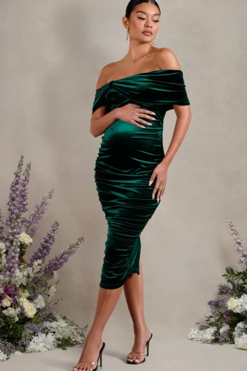 Alyssa | Bottle Green Velvet Maternity Bardot Bow Maternity Midi Dress with Ruching
